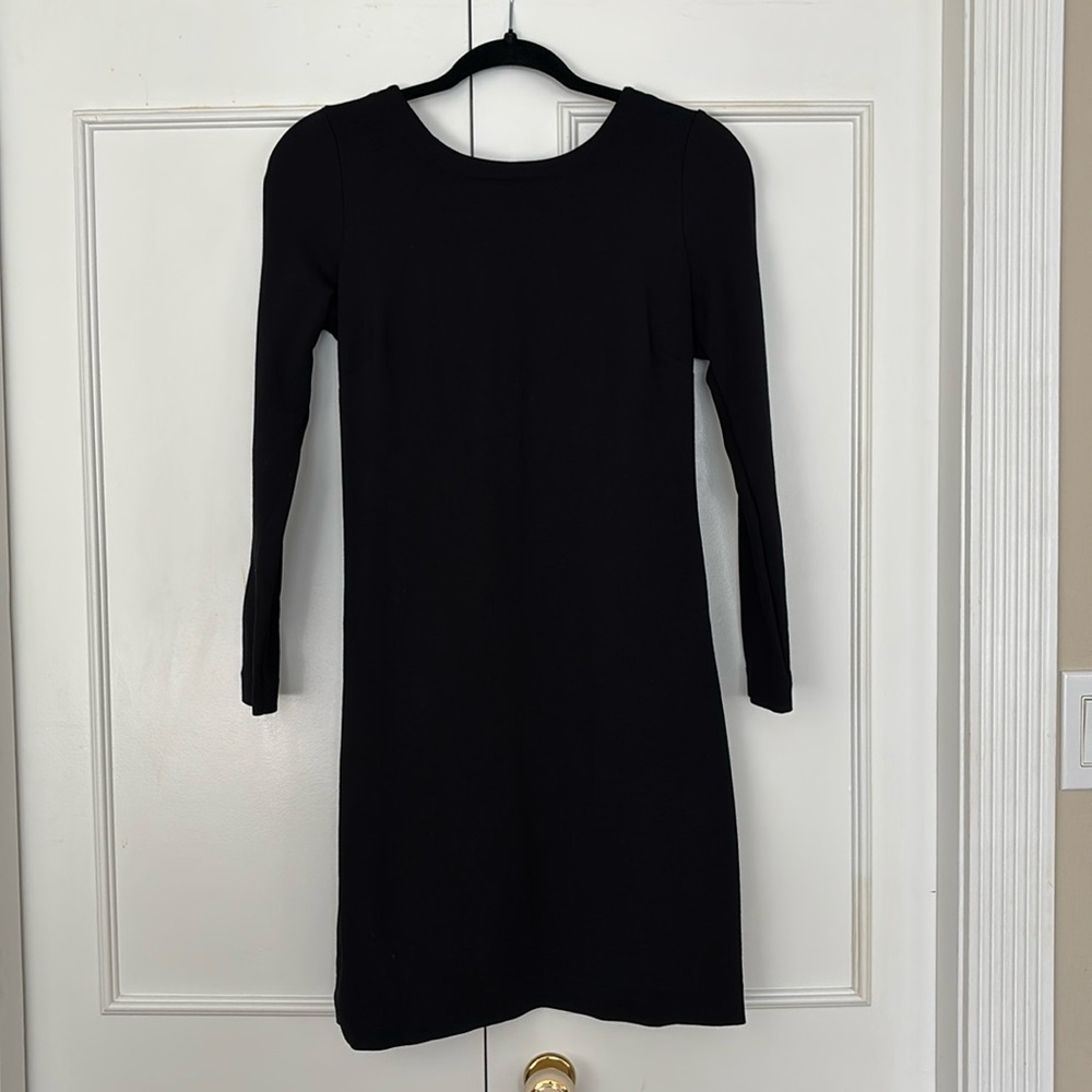 Perfect little black dress with v’d back and gold detail zipper